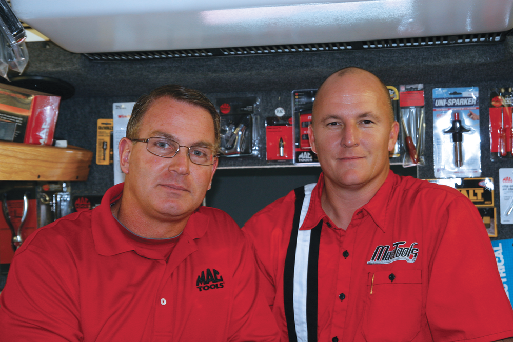 Mike O'Neil (left) is training Mike Archer to take over the route.