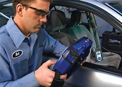 Uploading software from a scan tool through a wireless connection Uploading software from a scan tool through a wireless connection