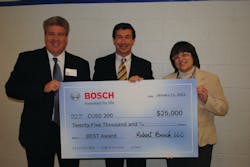David Coolidge, Executive Vice President, Americas, Robert Bosch LLC, (center) presented the award to Board of Education President, Rosemary Swanson and Superintendent Dr. Brian Harris at a recent school board meeting. David Coolidge, Executive Vice President, Americas, Robert Bosch LLC, (center) presented the award to Board of Education President, Rosemary Swanson and Superintendent Dr. Brian Harris at a recent school board meeting.