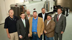 Pictured with the first of 60 Peterbilt LNG Model 388 Day Cabs that will be used by Green Energy Oilfield Services to provide vacuum and winch service to XTO Energy in the Freestone Play in Fairfield, Texas are (from l.) Ken Kirby, XTO Energy; Luke Bateman, Lone Star Investment Advisors; Keith Rand, Green Energy Oilfield Services; Roger Nevill, Green Energy Oilfield Services; Arthur Hollingsworth; Kent Kendall, Green Energy Oilfield Services; John McGuire, Lone Star Investment Advisors.