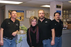 From left to right: Body shop manager John Korma, owners LeeAnne and Chris Walki, mechanical shop manager Joe Fordyce. From left to right: Body shop manager John Korma, owners LeeAnne and Chris Walki, mechanical shop manager Joe Fordyce.