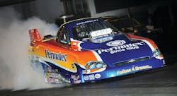 The Follow A Dream/Permatex 2008 Chevrolet Impala SS Top Alcohol Funny Car in burnout. The Follow A Dream/Permatex 2008 Chevrolet Impala SS Top Alcohol Funny Car in burnout.