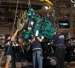 Workers at Volvo Trucks’ New River Valley assembly plant in Dublin, Va. lower a Volvo D13 engine onto a chassis Workers at Volvo Trucks’ New River Valley assembly plant in Dublin, Va. lower a Volvo D13 engine onto a chassis