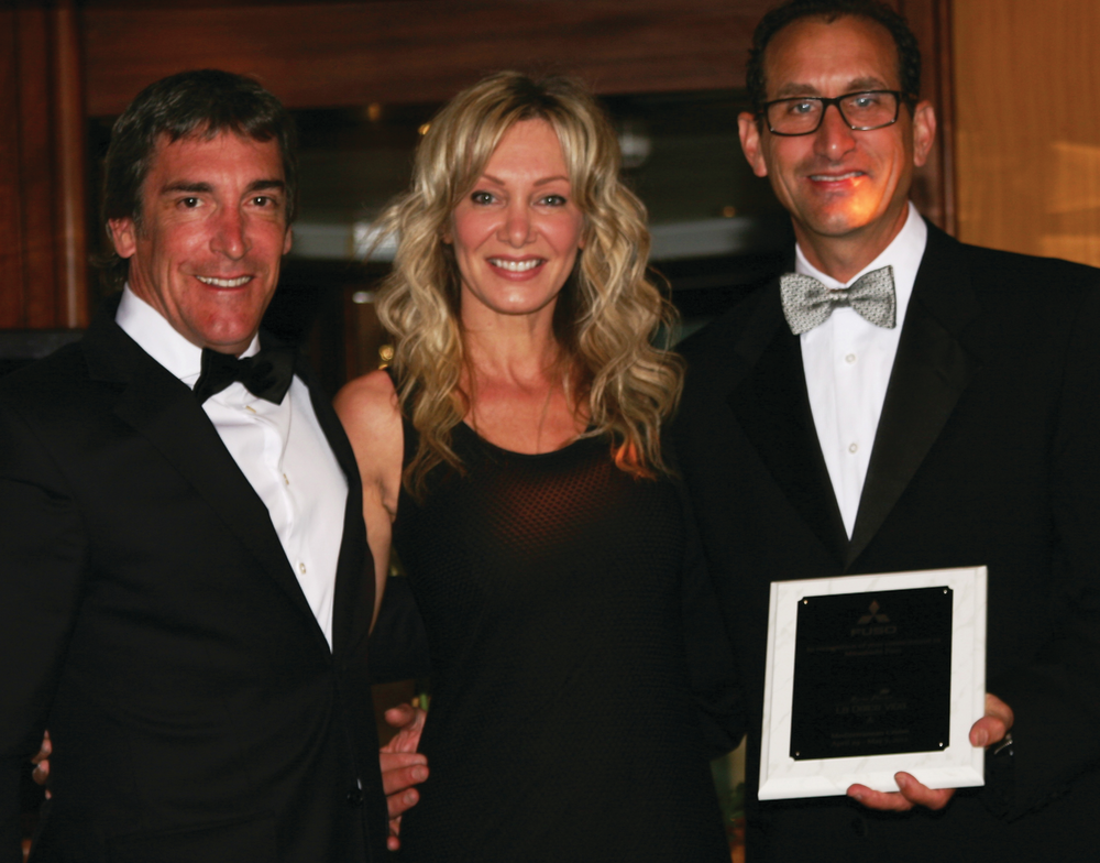Montreal Mitsubishi Fuso wins Mitsubishi Fuso North American Dealer of the Year. (l to r) Pierre Martin, Dealer Principal; Nathalie Roy, Sales Manager; Todd Bloom, President & CEO, Mitsubishi Fuso Truck of America.