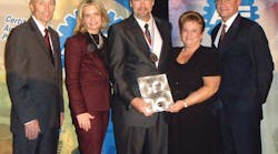 Mark Herman, third from left, accepts his award from Tim Zilke, ASE president and Kristen Davis of Delmar. Second from right is Herman's wife, Janet; at right is Greg Clayton of Delmar. Mark Herman, third from left, accepts his award from Tim Zilke, ASE president and Kristen Davis of Delmar. Second from right is Herman's wife, Janet; at right is Greg Clayton of Delmar.