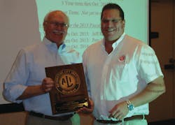 ALI President R.W. (Bob) O’Gorman, right, presents a service plaque to outgoing ALI Chairman Douglas Grunnet at the organization’s recent annual meeting. ALI President R.W. (Bob) O’Gorman, right, presents a service plaque to outgoing ALI Chairman Douglas Grunnet at the organization’s recent annual meeting.