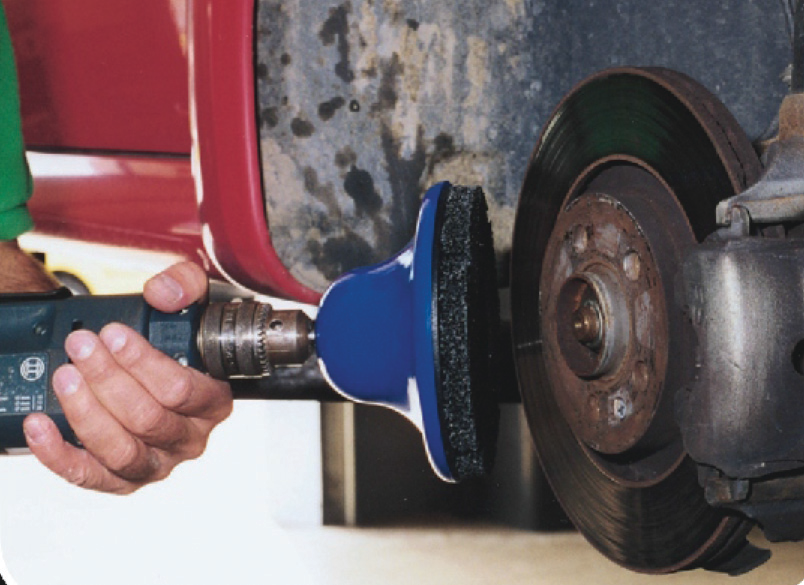 BEFORE: A wheel hub with residue, prior to using the Mueller Kueps Wheel Hub Grinder.