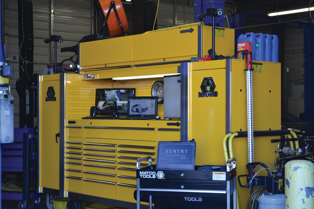 McGullam's toolbox, tool cart complete with scan tools, and the security system visible in the top of the picture.