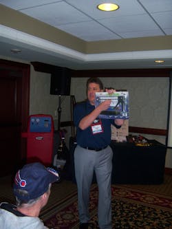 Dennis Eaton talks about Uview's Spotgun injection kit during a seminar at the Matco Tools national business conference. Dennis Eaton talks about Uview's Spotgun injection kit during a seminar at the Matco Tools national business conference.