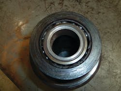 A bearing from a piece of farm equipment on its way to failure due to dirt and lack of viable lubricant. A bearing from a piece of farm equipment on its way to failure due to dirt and lack of viable lubricant.