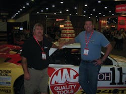 Bill Jaynes, left, and Chad Nelson of Titusville, Fla. enjoy race cars at the Mac Tools Tool Fair in Dallas, Texas. For more show photos, go to www.vehicleservicepros.com/10888366. Bill Jaynes, left, and Chad Nelson of Titusville, Fla. enjoy race cars at the Mac Tools Tool Fair in Dallas, Texas. For more show photos, go to www.vehicleservicepros.com/10888366.