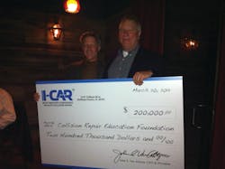At left, John Van Alstyne, I-CAR CEO and president, presents the check to Clark Plucinski, Collision Repair Education Foundation executive director. At left, John Van Alstyne, I-CAR CEO and president, presents the check to Clark Plucinski, Collision Repair Education Foundation executive director.
