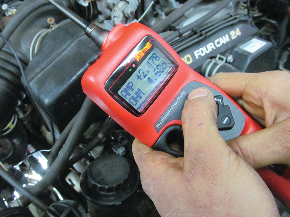 Figure 7: The PowerProbe Hook, here jumped to the power side of the A/C compressor, can quickly turn it on in order to confirm the compressor is in working condition. This Toyota 4Runner compressor pulls a about 2.5 amps even though it has a 10 amp fuse. For more information on this tool check out www.VehicleServicePros.com/10727921.