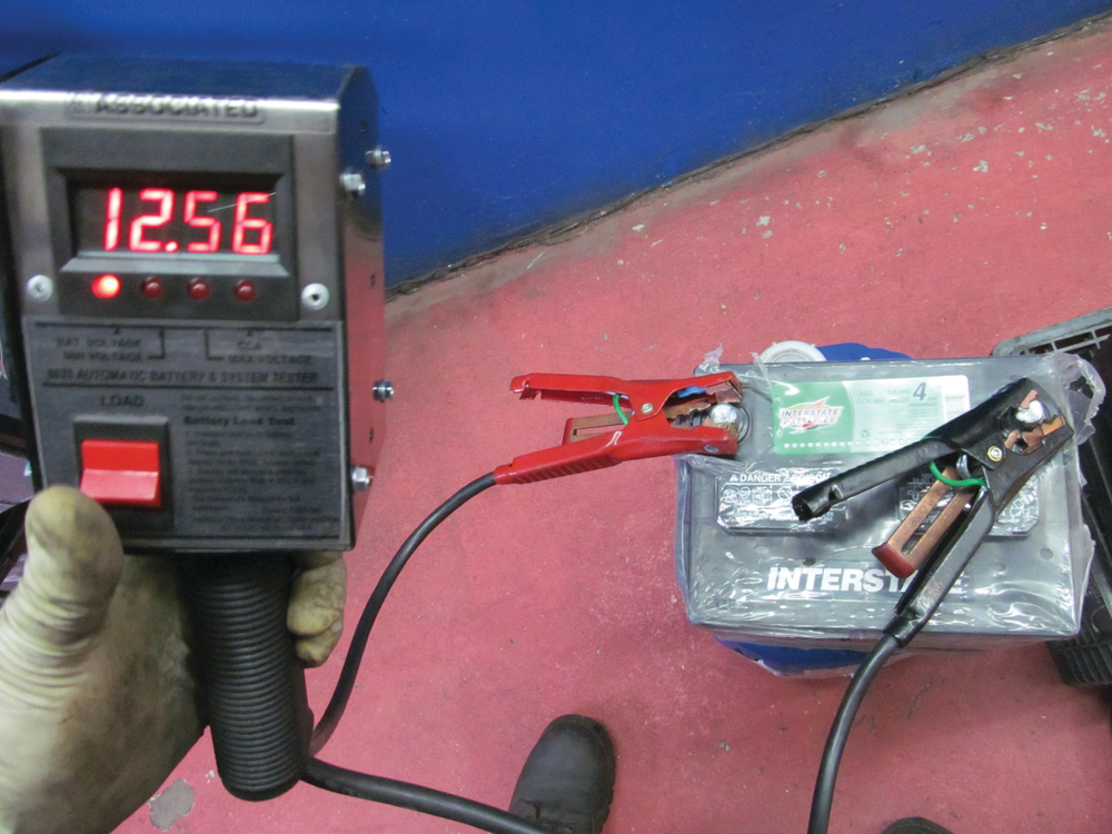 When the user puts the tester's clamps on the battery, it automatically tells him the battery's voltage.