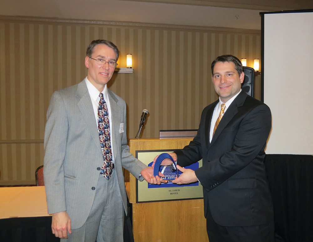 Hunter&rsquo;s Mike Douglas (left) accepts his Inventor of the Year Award from Paul Tietz, chair elect of BAMSL's patent, trademark and copyright) section.