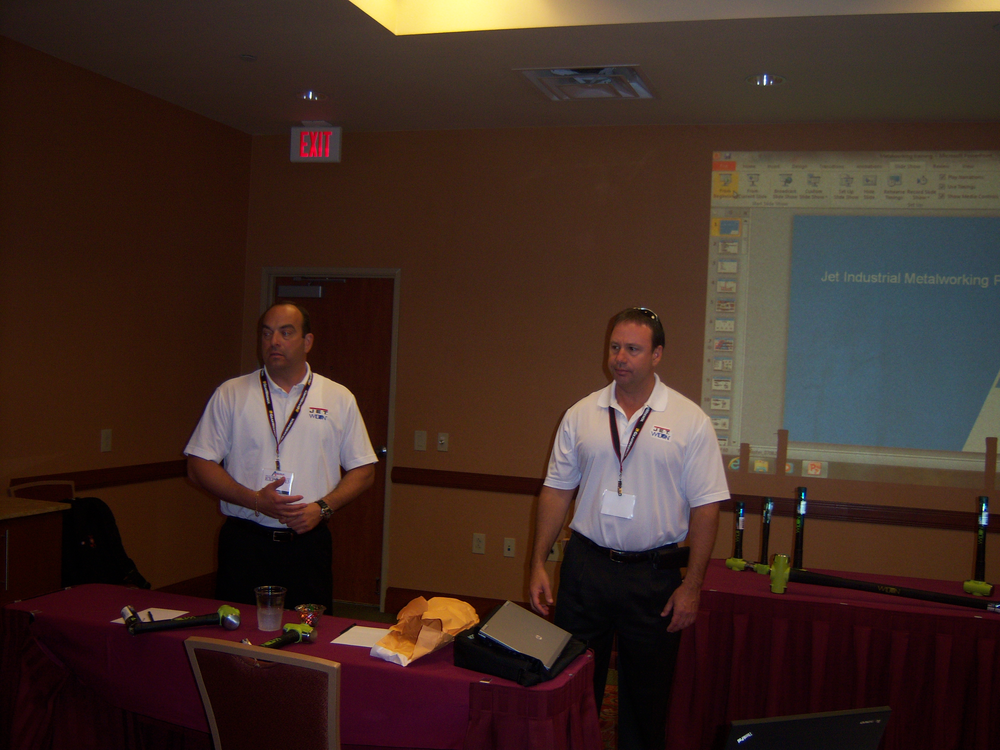 John Cella, left, and Steve Kaplan describe the benefits of the BASH hammers.