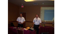 John Cella, left, and Steve Kaplan describe the benefits of the BASH hammers.