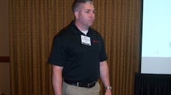 Andy Mandel of Ingersoll Rand answers questions about cordless power technology during the Ace Tool Co. national dealer expo in St. Petersburg, Fla. Andy Mandel of Ingersoll Rand answers questions about cordless power technology during the Ace Tool Co. national dealer expo in St. Petersburg, Fla.