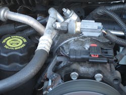 An A/C compressor in a 2004 Jeep Liberty. An A/C compressor in a 2004 Jeep Liberty.