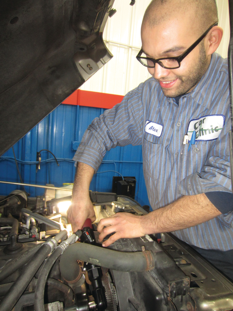 Portillo showing how the cordless ratchet can get into a tight spot.