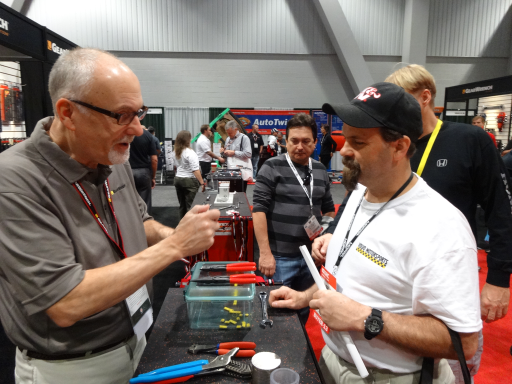 Bill Bliss, left, shows a 'gimble' ratchet to Chris Tegeles of Kayson Chevrolet, Crompond, N.Y.