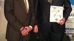 Greg Clayton of Cengage Learning honors Joseph Tuholski as the Cengage Learning/ASE Tech of the Year. Greg Clayton of Cengage Learning honors Joseph Tuholski as the Cengage Learning/ASE Tech of the Year.