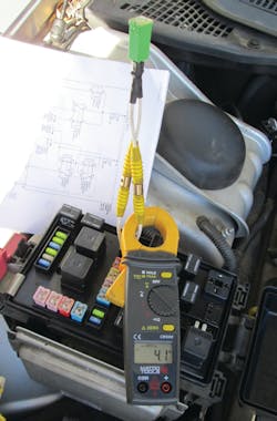 Fig. 1: The Matco CM600 shows that the current through the fans is 4.1 amps on the current probe. Fig. 1: The Matco CM600 shows that the current through the fans is 4.1 amps on the current probe.