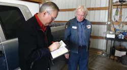 Shipler fills out a receipt for a customer.