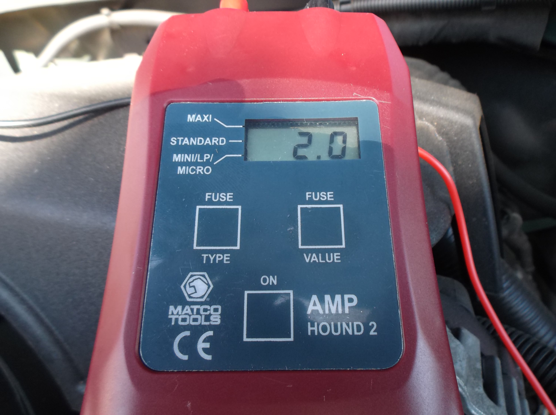 Fig. 2: After the customer had an opportunity to drive the trailer for a period of time to duplicate the original conditions, the amp draw test was repeated and showed a 2-amp draw. Using the Amp Hound 2 on the individual fuses in the underhood fuse box, we found the fuse to the trailer brake relay/controller (fuse 6) was drawing current. We also noted the trailer running lamp fuse was blown again. To confirm we were on the right path of our diagnosis, we disconnected the trailer connector and still had a 2-amp draw.