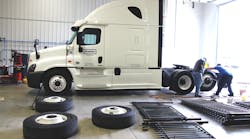 Placing Equal Flexx within the truck tires for the Ride and Drive event. Placing Equal Flexx within the truck tires for the Ride and Drive event.