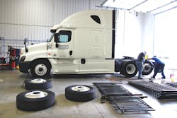 Placing Equal Flexx within the truck tires for the Ride and Drive event. Placing Equal Flexx within the truck tires for the Ride and Drive event.
