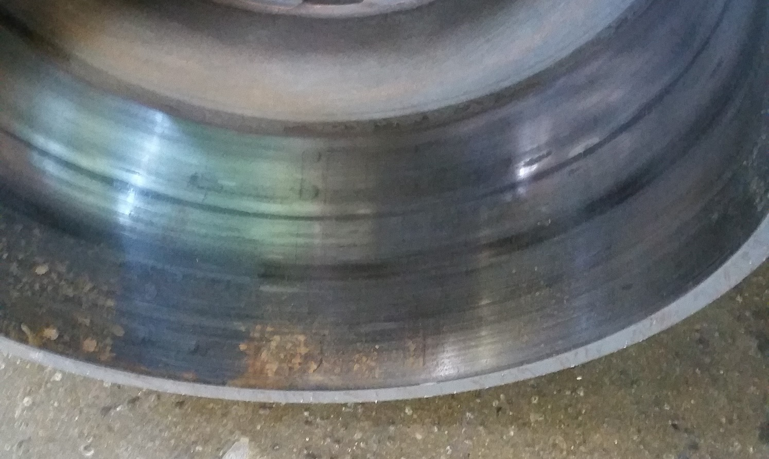 This drum, with less than 30,000 miles, shows early wear from aggressive friction material.