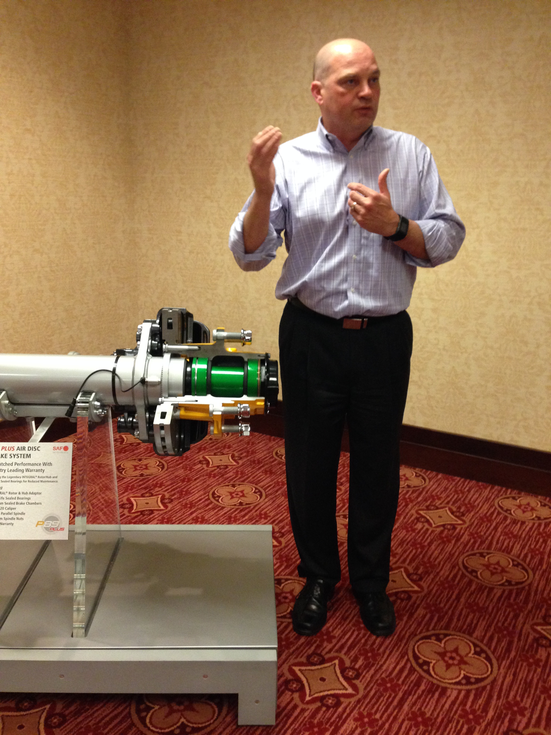 SAF-Holland's Doug Dorn provides details about the P89 Plus during a media event Thursday in Muskegon, Mich.