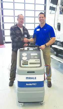 MACS member Bob Stockero (left), automotive instructor at Santa Barbara City College was the lucky recipient of an ArcticPRO ACX1180C courtesy of MAHLE Service Solutions. Stockero is congratulated by Chuck Kinkade, business development manager, MAHLE Service Solutions. Thirty-five technicians of all ages attended the clinic which included a demonstration of the ACX1180C recovery machine by Kinkade. MACS member Bob Stockero (left), automotive instructor at Santa Barbara City College was the lucky recipient of an ArcticPRO ACX1180C courtesy of MAHLE Service Solutions. Stockero is congratulated by Chuck Kinkade, business development manager, MAHLE Service Solutions. Thirty-five technicians of all ages attended the clinic which included a demonstration of the ACX1180C recovery machine by Kinkade.