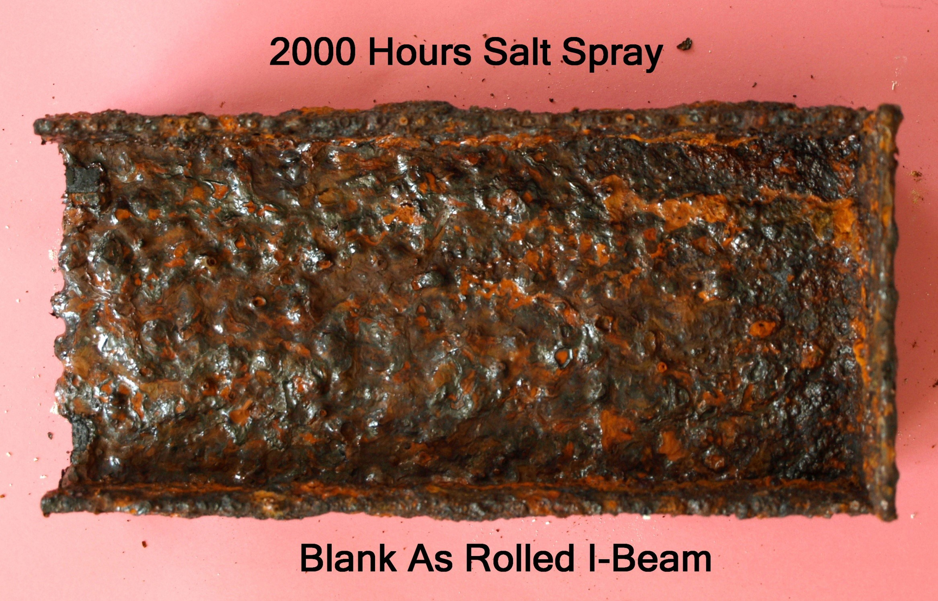 This untreated rolled I-beam section shows the effect that 2,000 hours of sodium chloride spray exposure can have on metal.