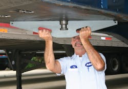 Figure 1. Check upper coupler plate flatness. Figure 1. Check upper coupler plate flatness.