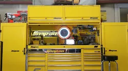 This bold yellow 124' Snap-on tool set up features a Snap-on Classic Series main box, two side lockers and a hutch.