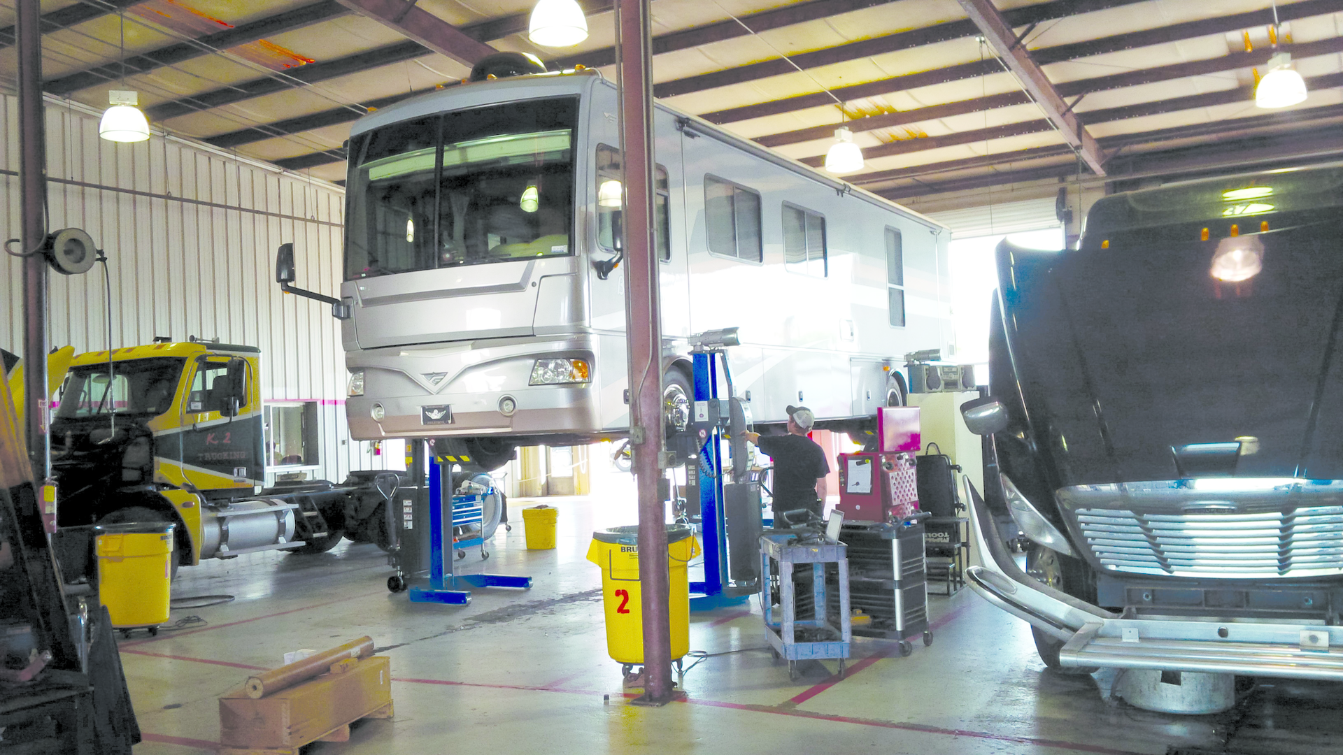 Among the factors to keep in mind when selecting a vehicle lift are the size, height and layout of the shop.