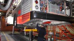 Servicing Bus On An Inground Rotary Lift