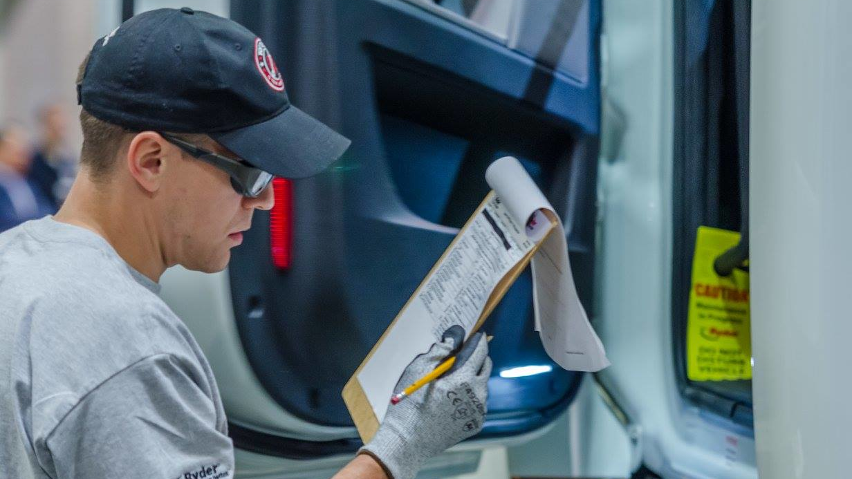 A technician reviews the criteria at his hands-on station during the 2017 Ryder Top Technician Recognition Program.