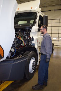 Penske technicians receive training to conduct PMs using voice-recognition software, recording responses verbally instead of by paper. Penske technicians receive training to conduct PMs using voice-recognition software, recording responses verbally instead of by paper.