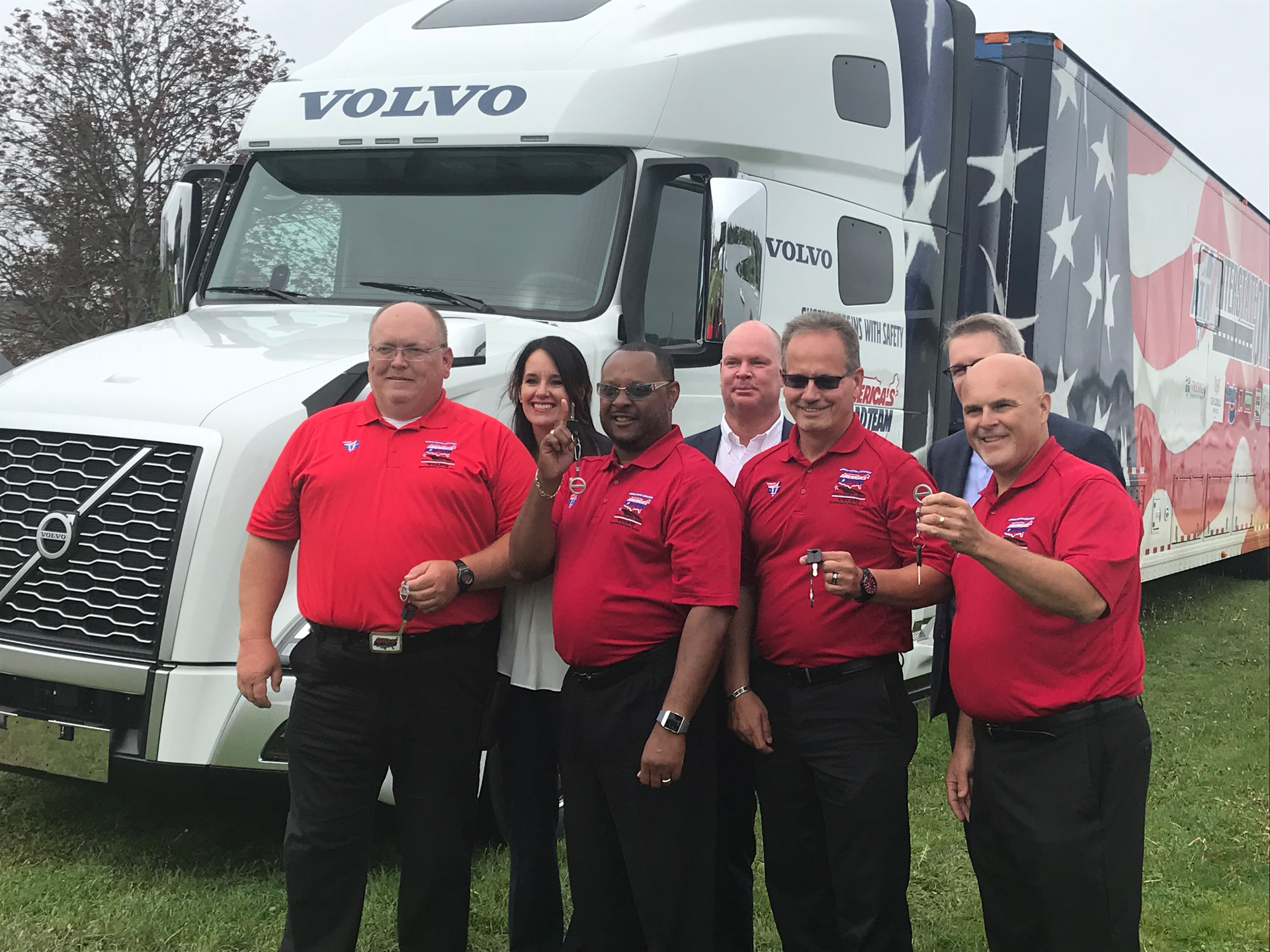 Representatives from Volvo Trucks North America and American Trucking Associations presented four America's Road Team captains with the keys to a new Volvo VNL 760 tractor.