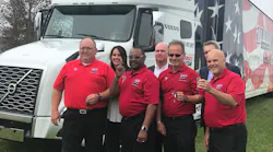 Representatives from Volvo Trucks North America and American Trucking Associations presented four America's Road Team captains with the keys to a new Volvo VNL 760 tractor.