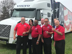 Representatives from Volvo Trucks North America and American Trucking Associations presented four America's Road Team captains with the keys to a new Volvo VNL 760 tractor.