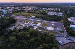 An aerial view of the Mcity Test Facility, which sits on a 32-acre site and features about 16 acres of roads and traffic infrastructure. An aerial view of the Mcity Test Facility, which sits on a 32-acre site and features about 16 acres of roads and traffic infrastructure.