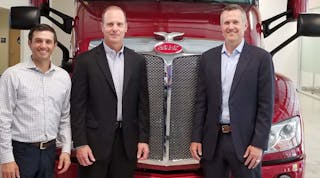 (Left to right) Jake Monetero, Paccar Innovation Center general manager; Scott Newhouse, Peterbilt chief engineer; and Jason Koog, Peterbilt general manager, pose with a Peterbilt at the Paccar Innovation Center in Sunnyvale, Calif.