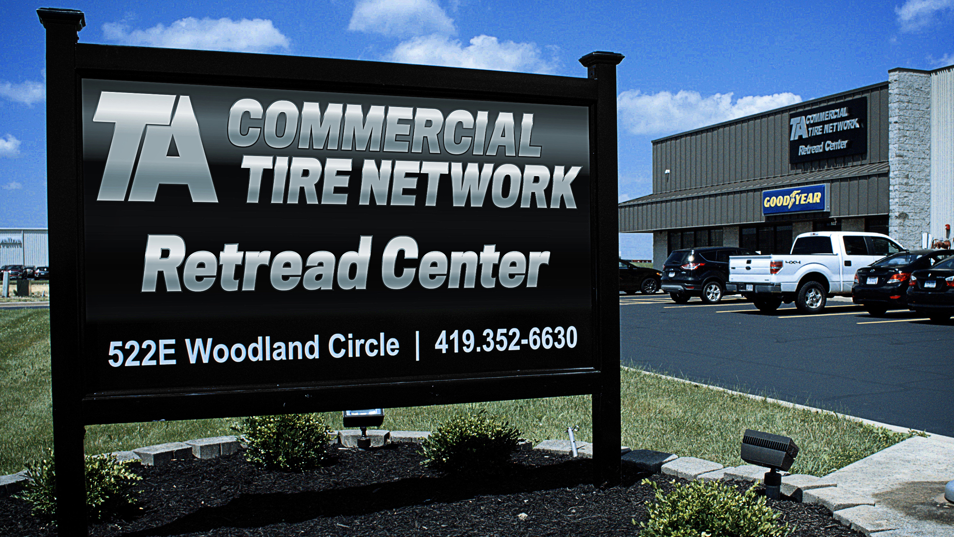 Retread Center Sign