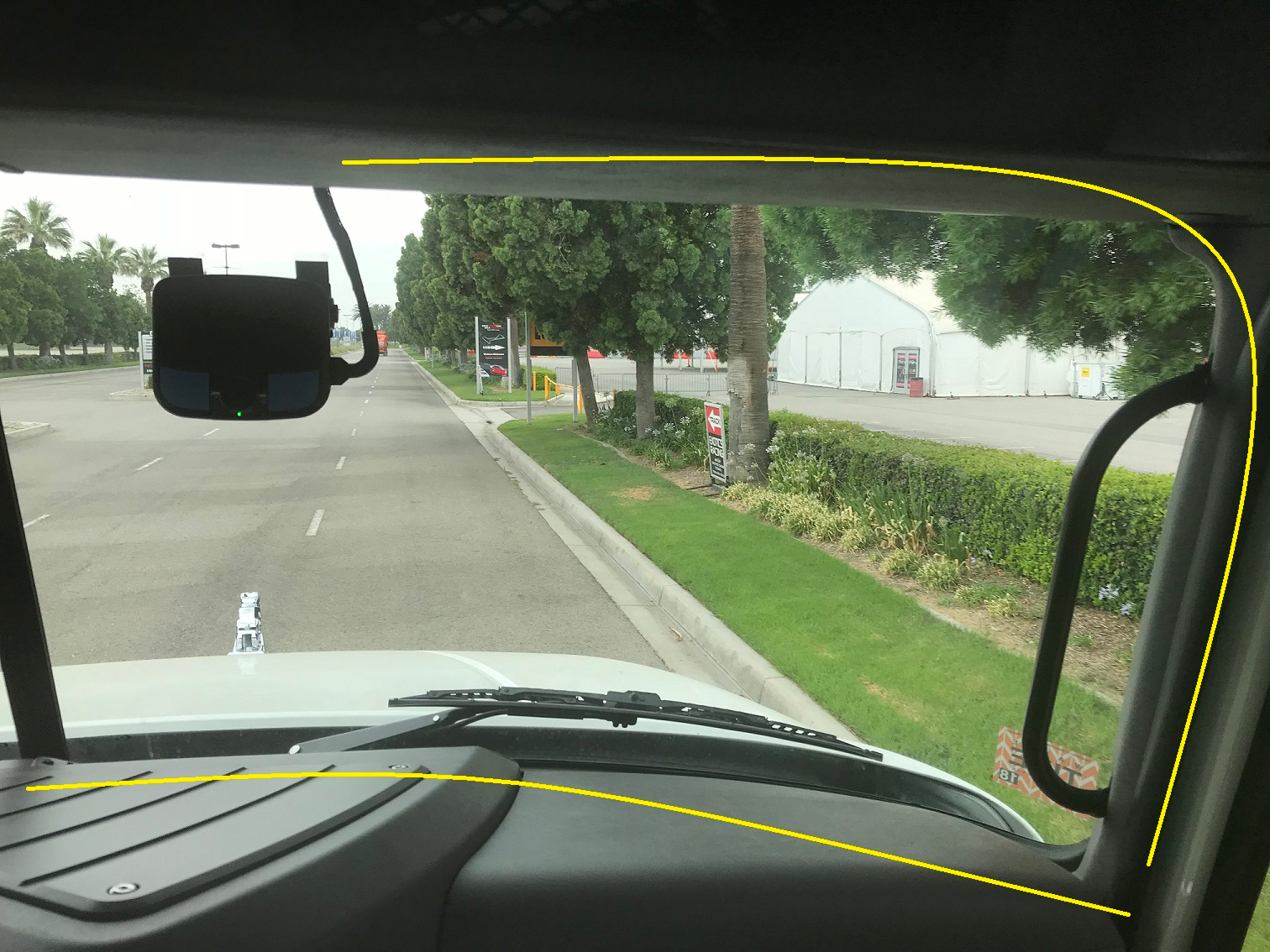 The pre-wiring for Lytx DriveCam hardware is illustrated here, with the yellow markings, indicating where the pre-wiring is located within the vehicle cab.