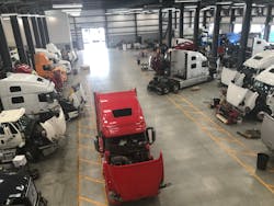 The shop features drive-through bays, and is organized by type of work, for designated bays dedicated to dedicated to just transmission work, chassis work, quick fix and uptime services, etc.