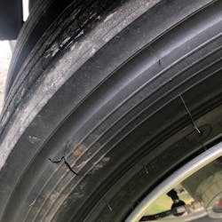 The punctured tire that caused the alert. The punctured tire that caused the alert.